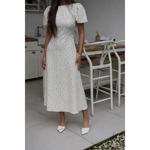 Elegante Vestido Estampado Floral con Corte Evase, Cuello Redondo, Cintura Natural, Tejido Transpirable, para Uso Diario Informal - Product Image 1