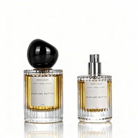 Bouteilles de parfum en verre rondes de luxe personnalisées de 30ml 50ml 100ml Flacon pulvérisateur vide à rayures verticales avec bouchon à bille