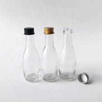 Petite bouteille vide de potion en verre à liqueur de gingembre de 2 oz de jus de Kombucha rond de Boston avec le chapeau de cône de poly joint