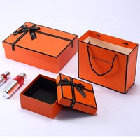 Boîte d'emballage cadeau de Noël 2 pièces avec couvercle et base orange imprimé de logo personnalisé en gros pour emballage cosmétique