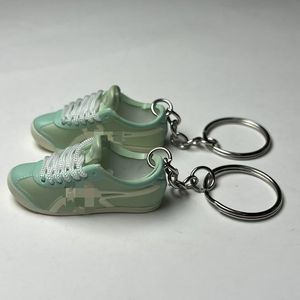 พวงกุญแจรูปรองเท้าไทเกอร์ 3 มิติ แบบโปร่ง รุ่นแฟชั่น  ของตกแต่งรูป<span class=keywords><strong>รองเท้า</strong></span>  จี้บรูซ <span class=keywords><strong>ลี</strong></span>  <span class=keywords><strong>รองเท้า</strong></span>กังฟูสีเหลือง  <span class=keywords><strong>รองเท้า</strong></span><span class=keywords><strong>ผ้าใบ</strong></span>ผู้ชาย - Product Image 5