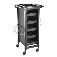 Chariot de rangement professionnel robuste et moderne noir pour salon, avec 4 tiroirs en plastique et roulettes, idéal pour le salon