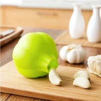 Éplucheur d'ail en silicone de qualité alimentaire pour la maison Accessoires de cuisine Presse-ail manuel Broyeur d'ail Gadget