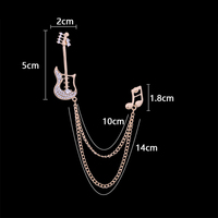 Broche en strass de luxe coréenne, motif note de musique, avec chaîne à pampilles guitare, épingles de revers et boucle de costume pour homme