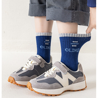 Chaussettes de sport personnalisées pour jeunes hommes, style hip-hop, tricotées jacquard, imprimé léopard, coussinées, en coton, pour l'entraînement et la course à pied