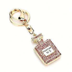 Porte-clés de luxe en alliage métallique avec pendentif en cristal brillant, boussole émaillée personnalisée pour breloque de sac femme, idéal pour l'art et l'artisanat - Product Image 3