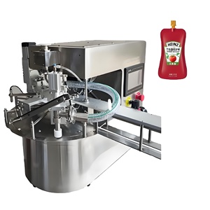 Petite machine de remplissage et de scellage de sachets entièrement automatique à aspiration rotative pour ketchup, beurre de cacahuète et pâtes - Product Image 1