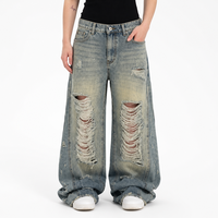 Jean droit vintage délavé pour homme, fabriqué sur mesure, avec déchirures prononcées, effet vieilli, appliqué en forme d'os, coupe droite, en denim