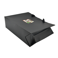 Sacs cadeaux en papier noir mat personnalisés avec logo, poignées longues, matériaux recyclés, design gratuit, luxe, pour vêtements et artisanat