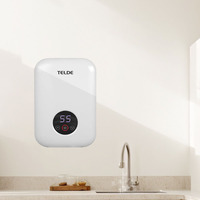 Pemanas Air Mini Instan Tanpa Tangki yang Dipasang di Dinding dengan Kontrol Suhu Cerdas dan Hemat Energi.