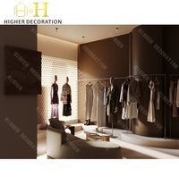 Aménagement intérieur de magasin de vêtements, présentoir à vêtements en métal sur mesure, comptoir de vente au détail, mobilier moderne pour magasin de vêtements