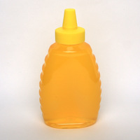 Bouteille souple de 500g avec bec verseur 38-360 et couvercle à valve en silicone, en PET scellé et anti-fuite, pour sauces, condiments et miel