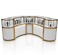 Comptoir d'exposition de montres incurvé de luxe sur mesure, vitrine en verre en acier inoxydable doré de qualité supérieure pour boutique de montres et de bijoux haut de gamme