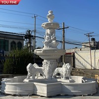 Fontaine Caryatide en marbre blanc sculptée à la main YOUFINE avec des statues de lions et un bassin à quatre feuilles pour jardin de villa