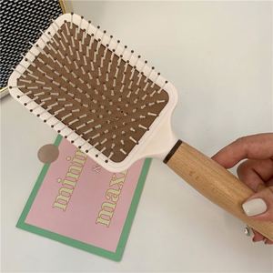 Cepillo de masaje con cojín de aire y mango de madera, antiestático, desenredante, para cabello rizado, de diseño sencillo y moderno - Product Image 5