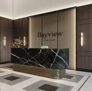 La fabbrica cinese produce un banco reception moderno nero in marmo artificiale per l'ufficio