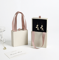 Boîte de rangement à bijoux rigide portable étanche en stock avec fermeture magnétique et poignée métallique pour bagues, boucles d'oreilles, montres et lunettes