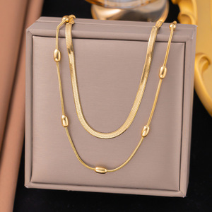 Ensemble collier et bracelet de cheville double couche en acier inoxydable plaqué or PVD 18 carats motif os de serpent |   Accent de perle ovale |   Bijoux d'été qui ne se décolorent pas - Product Image 2