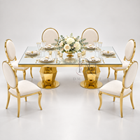 Table de banquet rectangulaire de luxe en acier inoxydable avec plateau miroir et base géométrique sur piédestal pour événements de mariage
