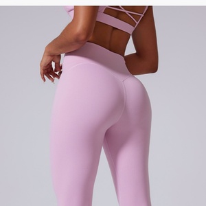 Hot Sale Customized Autumn Winter Yoga <b>Leggings</b> High Waist Crossover Design Nude Curved M-<b>Shaped</b> Peach Tight Breathable Nylon - Product Image 2