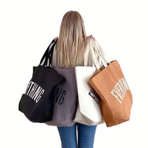 Sac de plage et de shopping décontracté en toile de coton réutilisable, extra large, écologique, à bandoulière unique, avec motif de dessin animé, personnalisable pour la vente en gros - Product Image 3