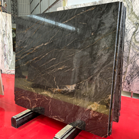 Dalle de marbre de luxe en or noir pour carreaux de sol comptoirs de cuisine panneau mural escalier en marbre Table à manger en marbre baignoire évier