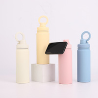 Bouteille isotherme en acier inoxydable de 18 oz avec bouchon à vis, poignée à anneau magnétique et finition thermolaquée pour la randonnée et les activités de plein air