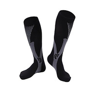 Vente en gros de chaussettes Chaussettes de football longues unisexes Chaussettes de compression respirantes pour hommes et femmes