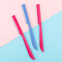 Tondeuse à sourcils en acier inoxydable pour le modelage des sourcils et l'épilation du visage avec capuchon de protection