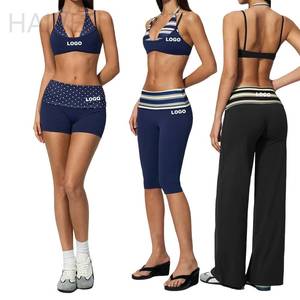 Ensemble de yoga respirant pour femme, personnalisé OEM, en tissu brossé, avec soutien-gorge de sport à bretelles halter, short à taille pliée et legging capri, pour le sport et le yoga - Product Image 1
