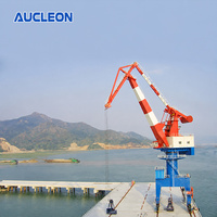 Grue portique mobile rotative sur rail de 15 tonnes, structure compacte, fabriquée en Chine, pour le chargement en quai