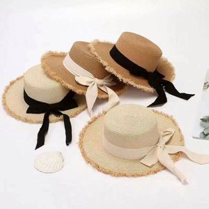 Wholesale Female Bow Large Brim Sun Beach <b>Hat</b> <b>Flat</b> Top Women's Summer <b>Hat</b> Raffia Straw <b>Hats</b> - Product Image 1