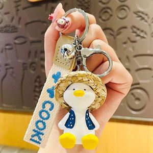 Wholesale Resin 3D Cartoon Happy Duck Keychain Cute Woven Straw Hat Duck Exquisite Accessories Bag Pendant Gift <b>Key</b> <b>Chain</b> - Product Image 4