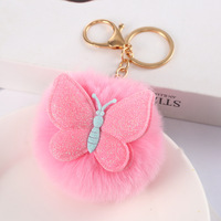 Nouveau porte-clés portable en forme de papillon en fourrure de lapin dorée, peluche 3D, fausse fourrure douce, alliage, sac pour femme, voiture, couple