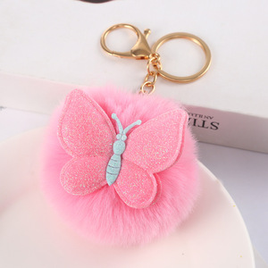 พวงกุญแจขนกระต่ายรูปผีเสื้อ 3 มิติ น่ารัก สีทอง ประดับด้วยผงทอง ขนนุ่ม พกพาสะดวก ใช้ได้กับกระเป๋าผู้หญิง รถยนต์ ของคู่รัก - Product Image 5