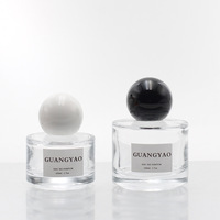 Vente en gros de flacons de parfum en verre transparents de 30 ml, 50 ml et 100 ml, cylindriques, écologiques, avec pompe et bouchon à vis, impression sérigraphique