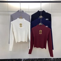 Pull sexy ajouré à col montant asymétrique pour femme, collection automne 2025, t-shirt chaud à manches longues de couleur unie