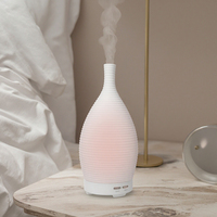 Humidificateur d'aromathérapie en céramique blanche simple et élégant, diffuseur d'aromathérapie, installation de table avec alimentation USB pour voiture et maison, 1 an