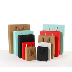 Venta caliente llena de colores marrón blanco logotipo personalizado mango de <span class=keywords><strong>tela</strong></span> bolsas de papel de Kraft para regalo y <span class=keywords><strong>ropa</strong></span> - Product Image 1