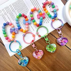 Porte-clés personnalisé avec perles et paillettes liquides, cœur et nœud arc-en-ciel, sangle de téléphone Kawaii pour filles, cadeau d'anniversaire pour adolescentes, vente en gros - Product Image 5