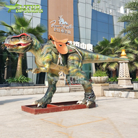 Dinosaure animatronique T-rex à roulettes pour balades