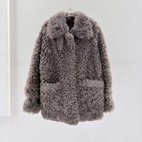 Veste en fourrure d'agneau de luxe pour femmes, style décontracté d'hiver, avec col et poignets uniques, doublure en peau de mouton, pour un usage quotidien élégant