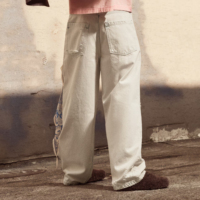 Jean en denim ultra-détendu pour homme, coupe ample et extra large, style streetwear urbain, taille mi-haute, déchiré, couleur claire