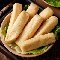 Bouffées de tofu frites, en forme de longues bandes, texture épongeuse, absorbent la sauce, parfaites pour le hot pot et les ragoûts