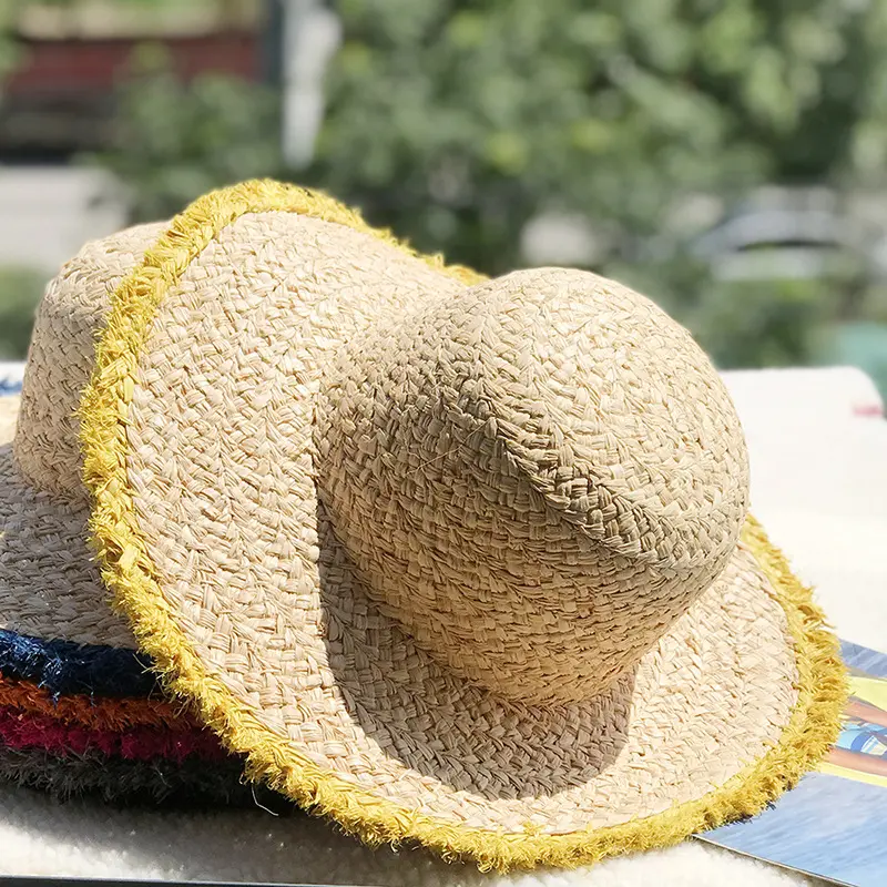 Großhandel Vintage Frauen Sommer natürliche Raffia Strohhut rohe ausgefranste Kante breite Krempe Strand hut handgemachte Zopf Raffia Strohhut