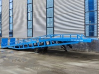 Rampe de chargement hydraulique mobile pour centre de distribution et manutention de conteneurs