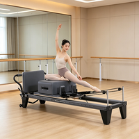 Reformer de Pilates Premium Noir en Alliage d'Aluminium avec Résistance Réglable pour Studio Professionnel et Bien-être