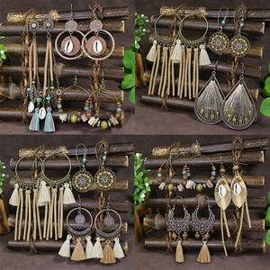 Pendientes bohemios con borlas, pendientes colgantes de aleación de cobre con conchas para mujer, conjunto de joyería para fiesta, pendientes largos con flecos chapados en bronce antiguo - Product Image 1