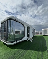Cabine d'hôtel mobile de luxe en acier étanche avec structure en acier, alimentation solaire et design moderne