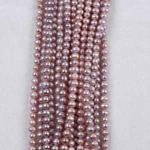 Perles d'eau douce blanches presque rondes de 6-7 mm en gros de Zhuji, perles naturelles semi-finies pour le bricolage - Product Image 4